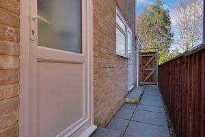 Side Access (Door to Kitchen + Garage)- click for photo gallery